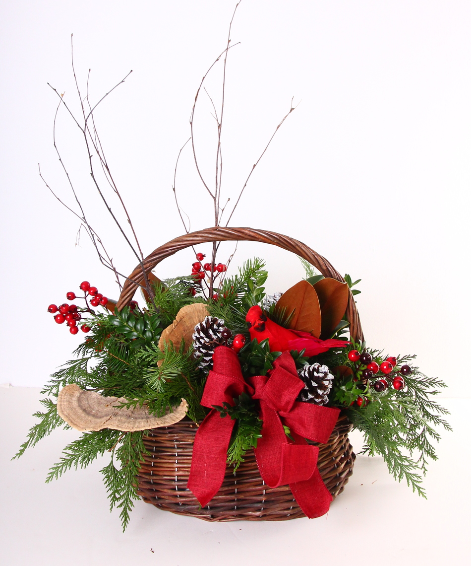 christmas flower arrangements in baskets