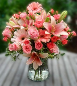 Asiatic lilies, gerbera, miniature cluster roses and large roses