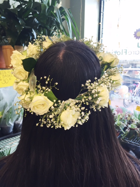 Flower Crown made out of white spray roses and baby's breath