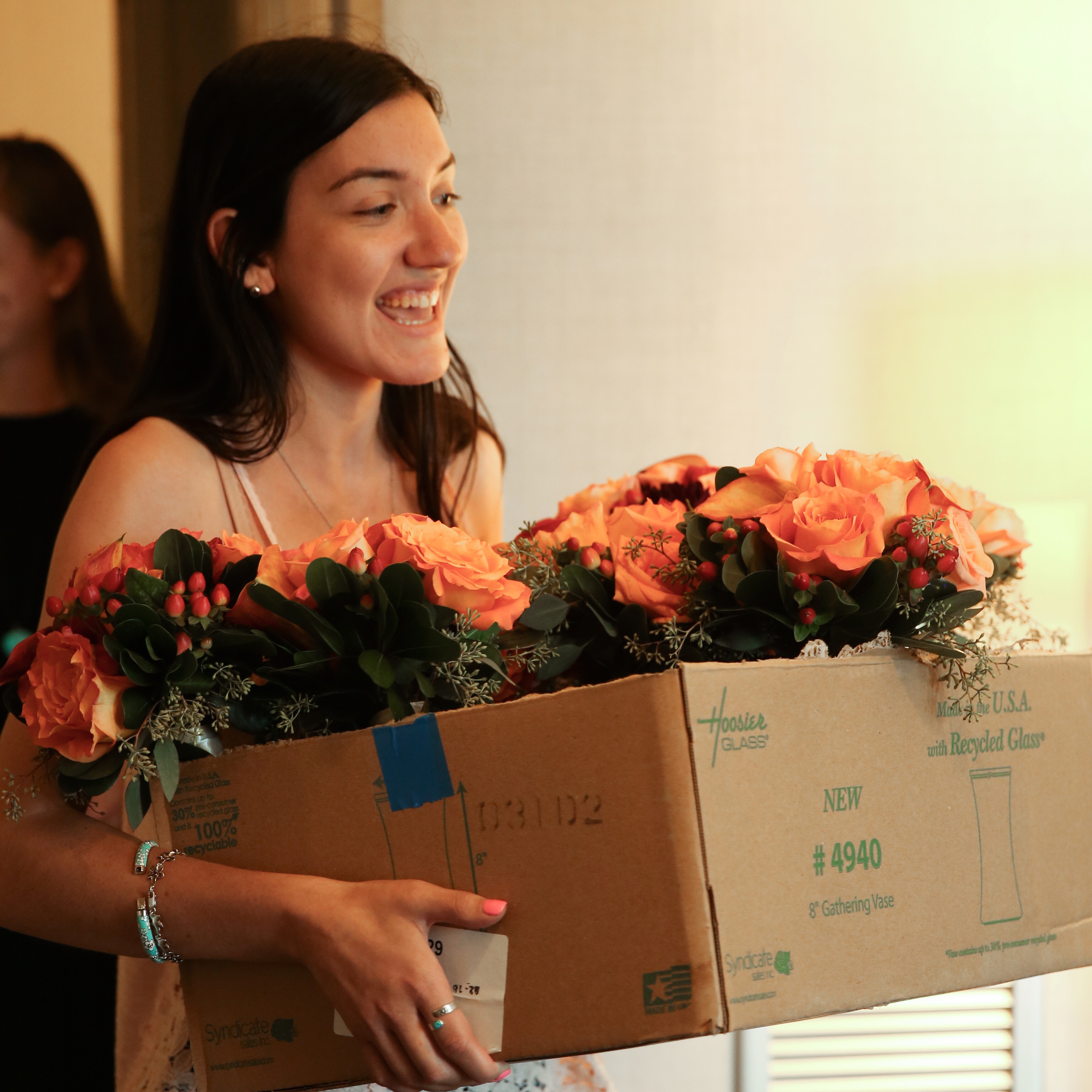 Jackie at the Royal Sonesta Boston delivering flowers to the bridal suite