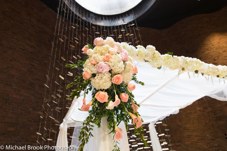 Close-up of the flowers attached to the chuppah