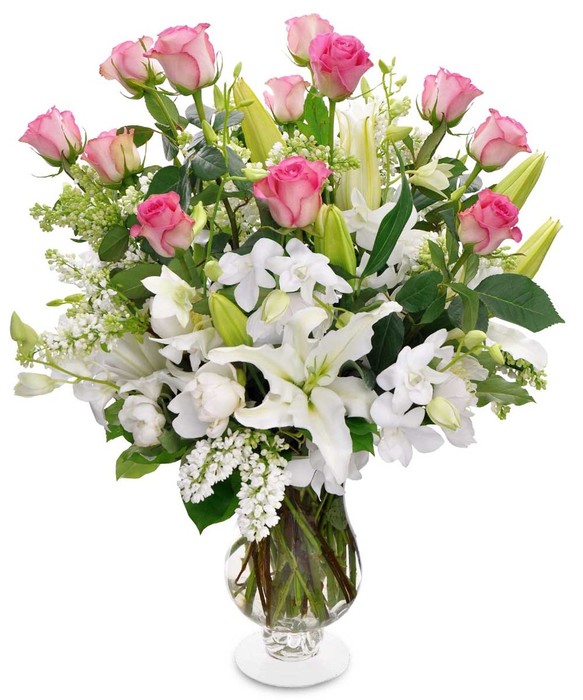 Lillie's, Tulips and Roses in a clear glass vase 