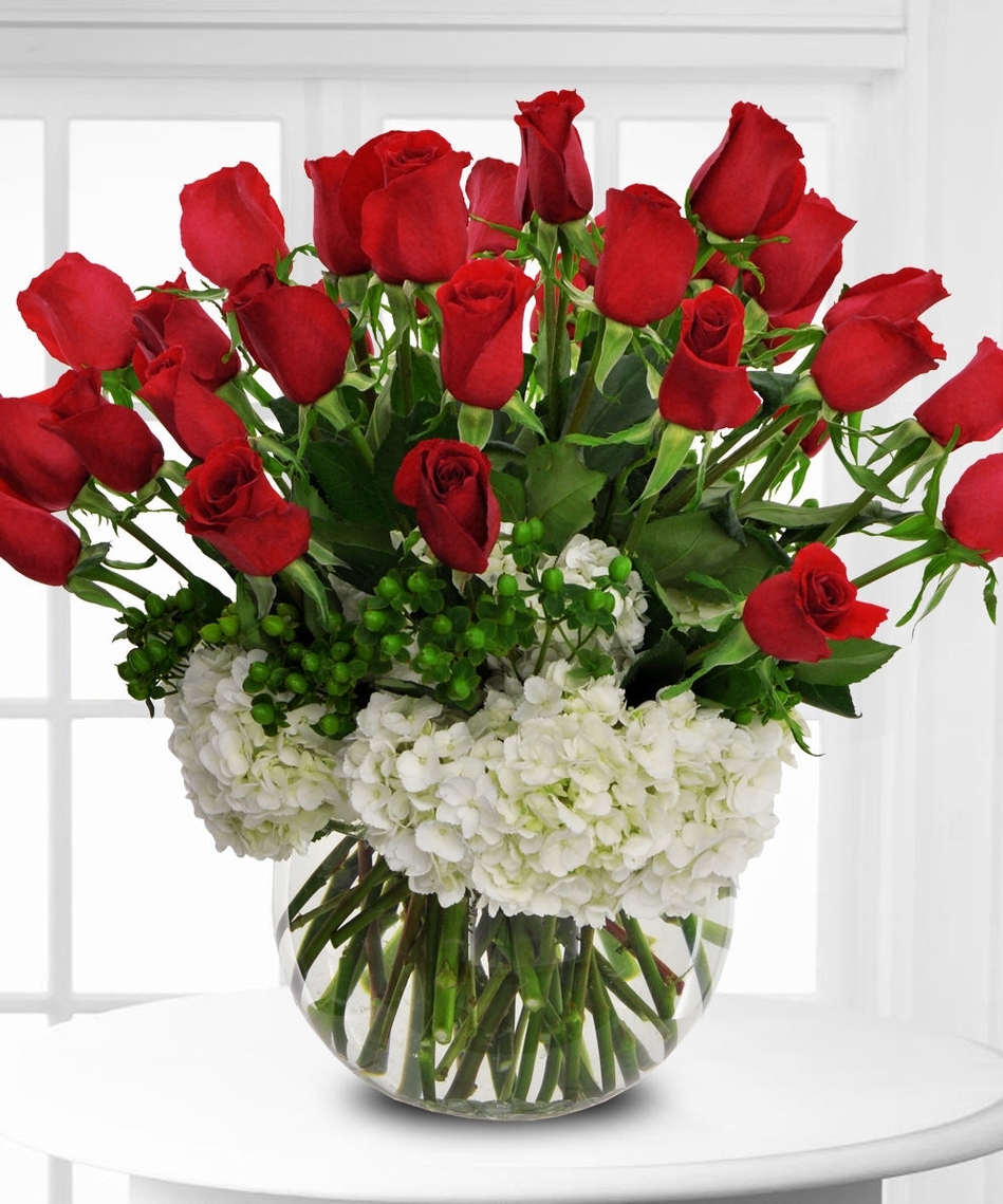 red roses with white hydrangas and greenery