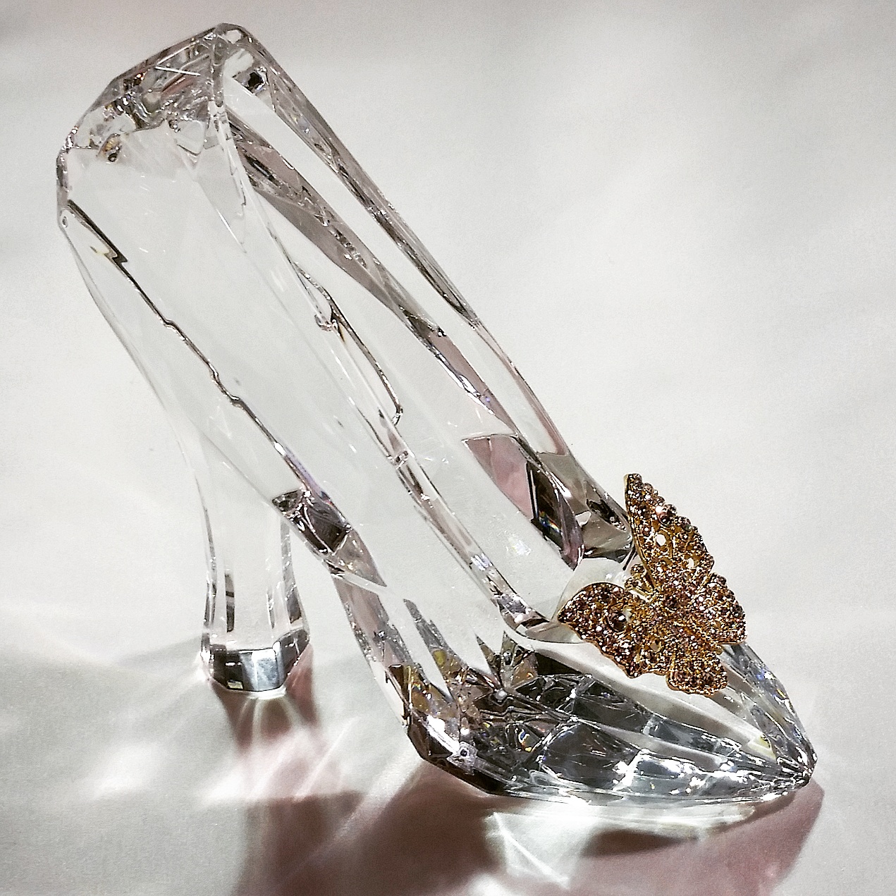 The iconic glass slipper from the set of Disney's beloved classic, Cinderella. 