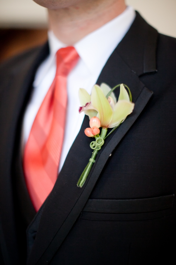 Yellow orchid boutonniere