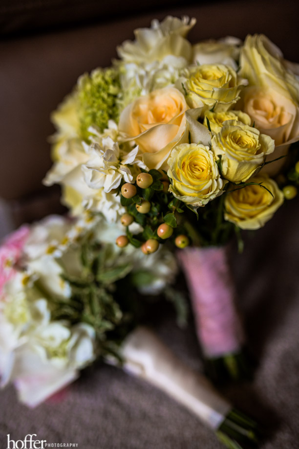 The bridesmaids carried yellow and blush-toned bouquets