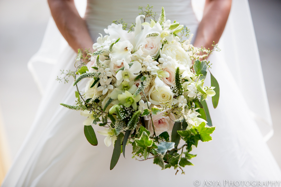 Bridal bouquet of mixed whites, pink and yellow accent blooms and ivy