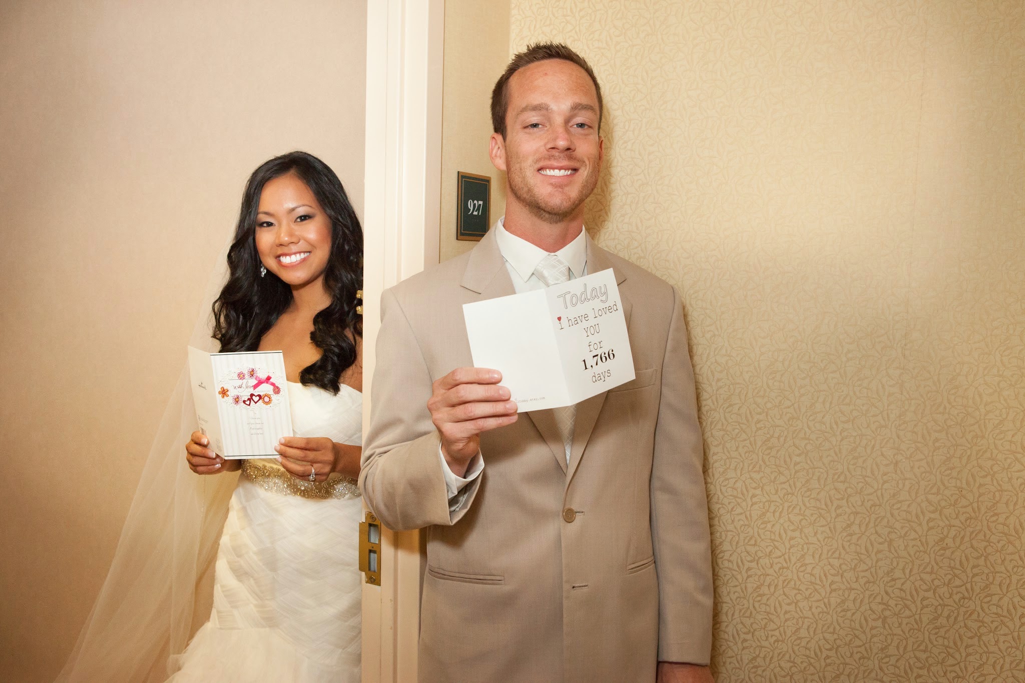 The bride and groom exchange love note before the ceremony