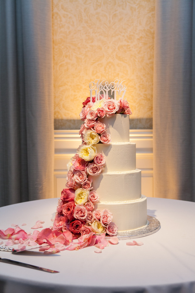 Rose covered wedding cake