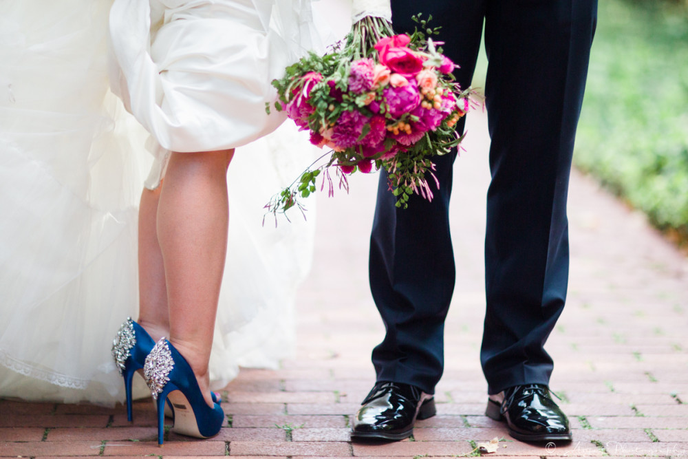 Blue bridal shoes and bouquet