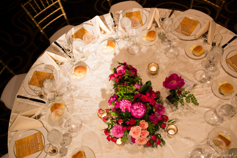 gold and ho pink guest table