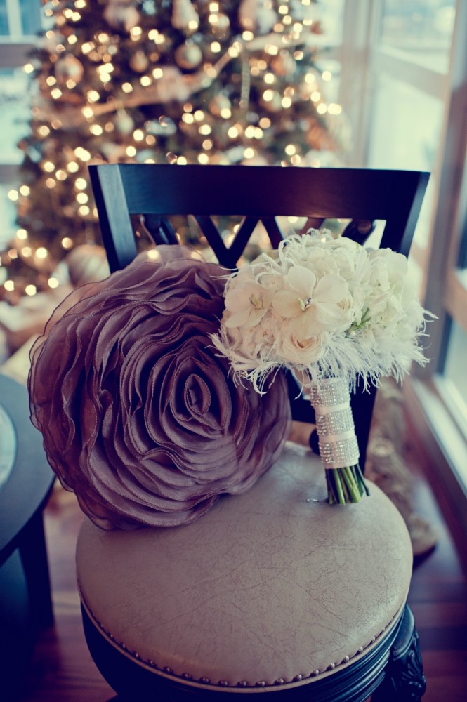 white bouquet with feathers