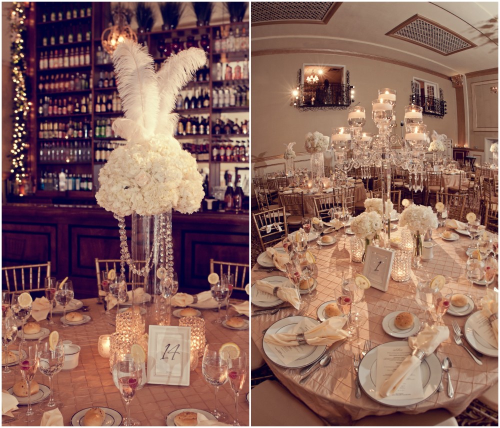 tall crystal centerpieces of white blooms, feathers and crystals