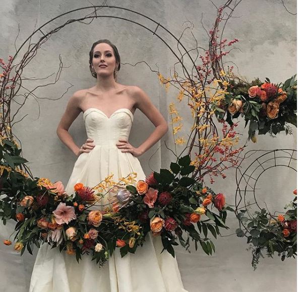 suspended floral wreath wedding trend